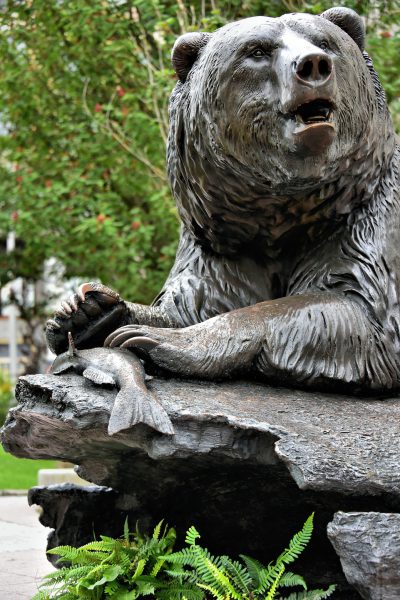 Brown Bear with Salmon Sculpture in Juneau, Alaska - Encircle Photos