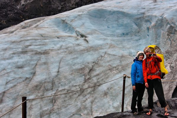 Young Couple Taking Selfie at Exit Glacier near Seward, Alaska - Encircle Photos