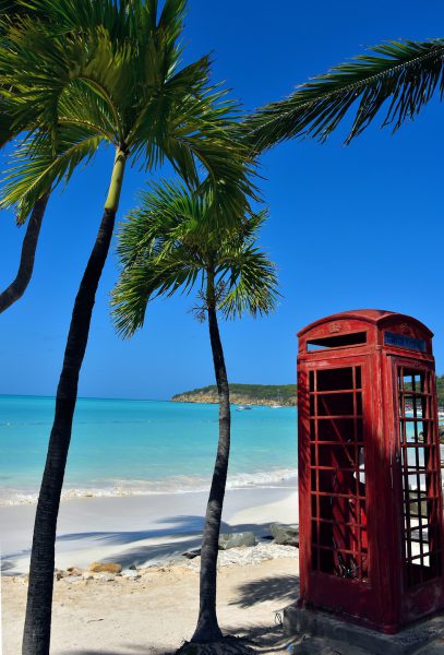 Red British Phone Booth at Dickenson Bay in St. John’s, Antigua - Encircle Photos
