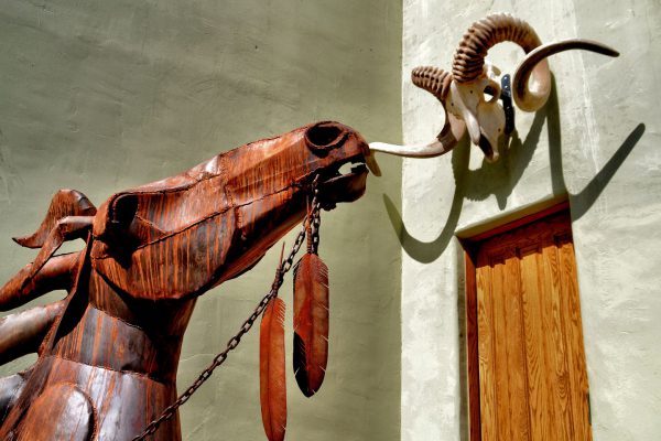 Sheet Metal Horse Sculpture and Longhorn Sheep Skull in Scottsdale, Arizona - Encircle Photos