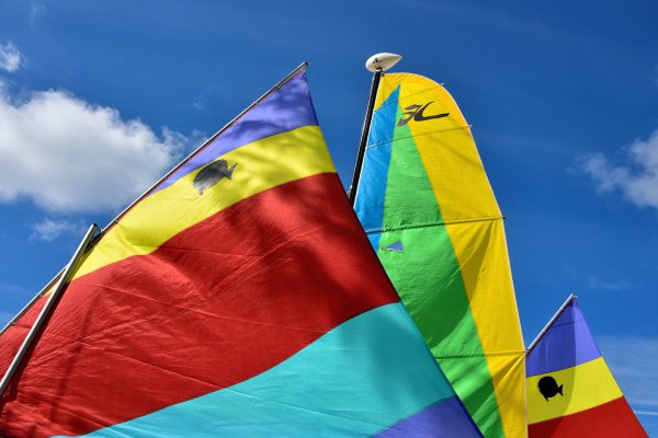 Colorful Sailboat Sails at Half Moon Cay, The Bahamas - Encircle Photos