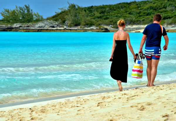 Couple Walking along Beach at Half Moon Cay,  Bahamas - Encircle Photos