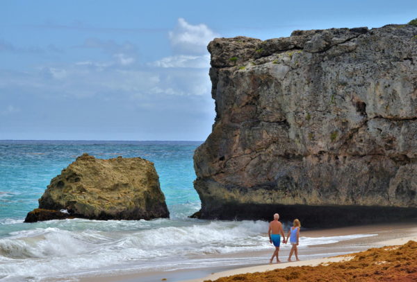Holding Hands at Bottom Bay in Apple Hall, Barbados - Encircle Photos