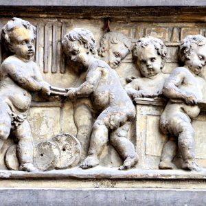 Chubby Haberdasher Babies Relief on Fox Guildhall Façade in Brussels, Belgium - Encircle Photos