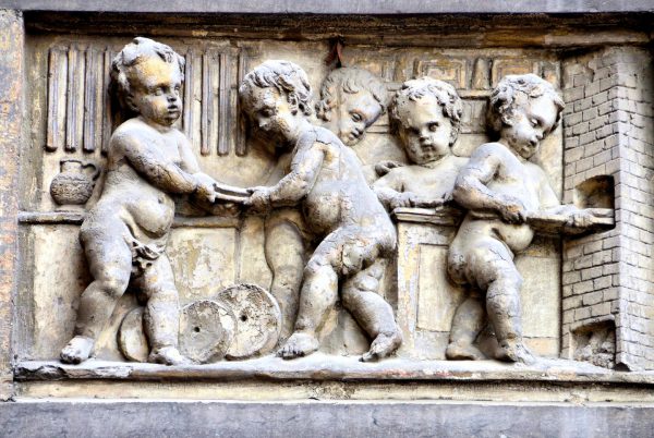 Chubby Haberdasher Babies Relief on Fox Guildhall Façade in Brussels, Belgium - Encircle Photos