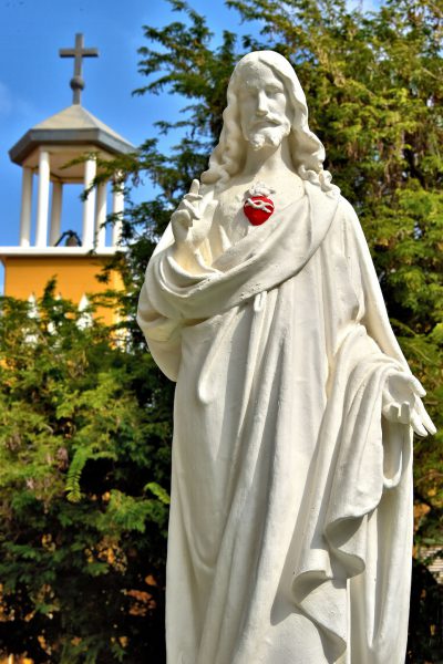 Christ Statue in Front of Church Tower in Kralendijk, Bonaire - Encircle Photos