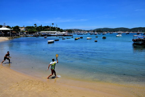 Beach Paddleball Game in Búzios, Brazil - Encircle Photos