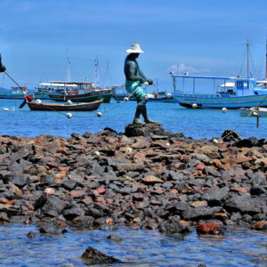 Three Fishermen Statues in Búzios, Brazil - Encircle Photos