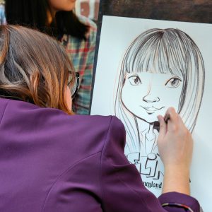 Caricature Artist in New Orleans Square at Disneyland in Anaheim, California - Encircle Photos