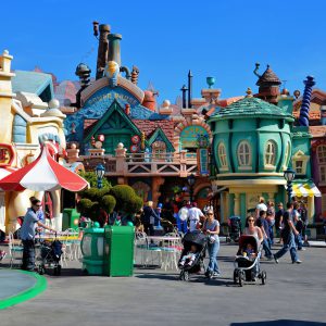 Parents Pushing Strollers in Mickey’s Toontown at Disneyland in Anaheim, California - Encircle Photos