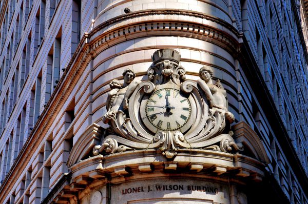 Clock over Lionel J. Wilson Building in Oakland, California - Encircle Photos