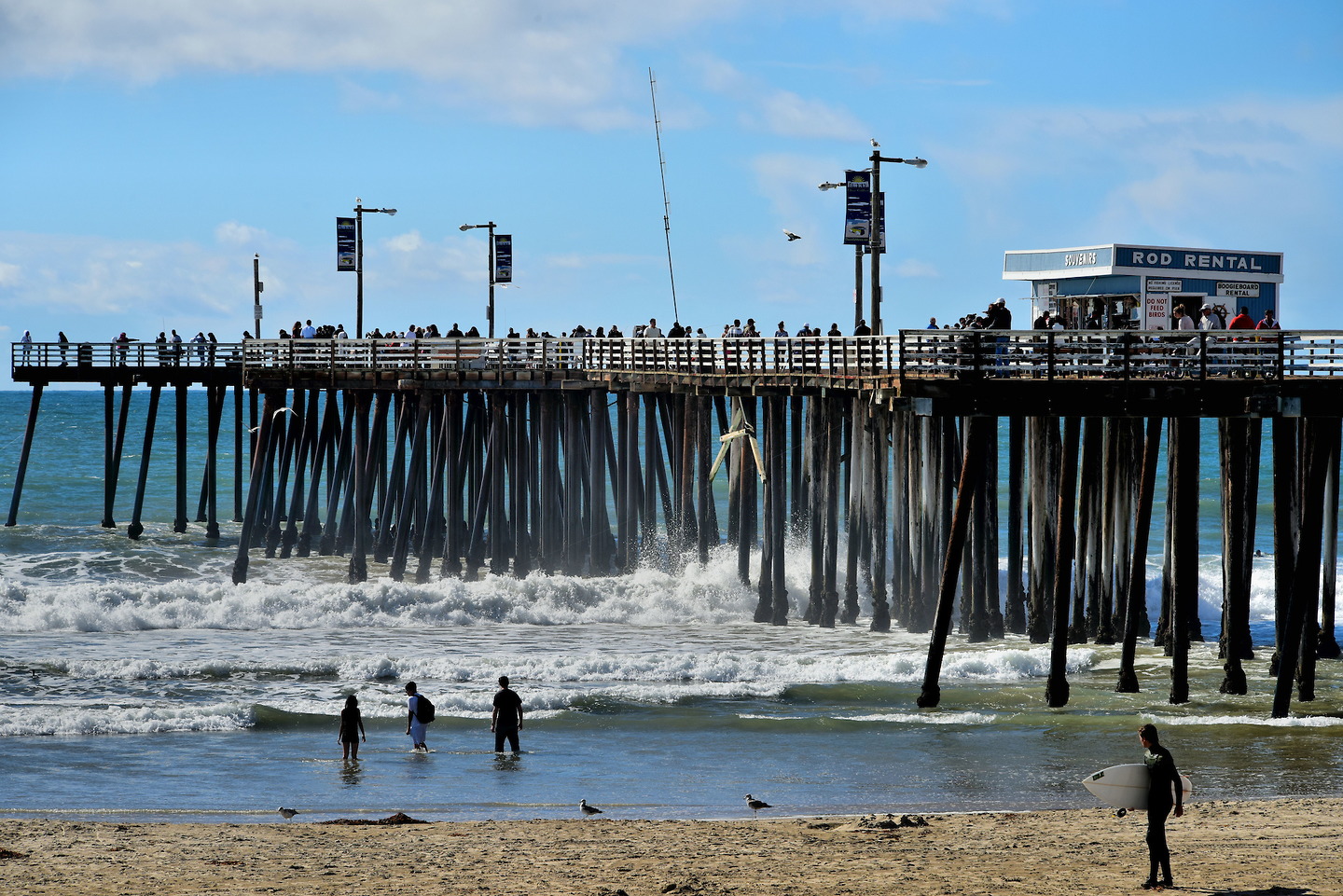 Waves Crashing Against Pismo Pier in Pismo Beach, California Encircle