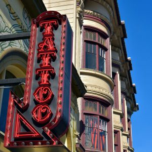 Tattoo Neon Sign and Victorian Building in San Francisco, California - Encircle Photos