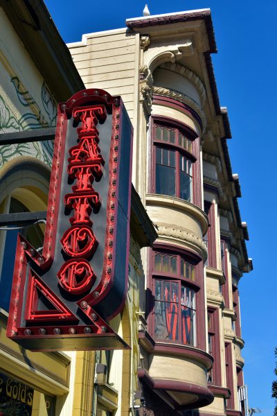Tattoo Neon Sign and Victorian Building in San Francisco, California - Encircle Photos