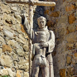 Father Serra and Indian Boy Statue at Mission San Juan Capistrano in California - Encircle Photos