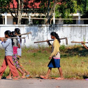Young Girls Going to Work in Farm Fields in Cheung Prey District, Cambodia - Encircle Photos