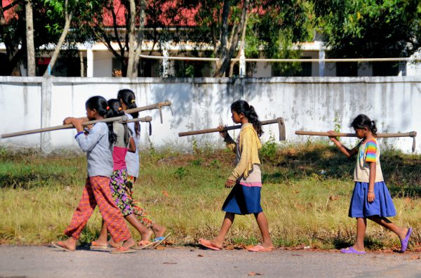 Young Girls Going to Work in Farm Fields in Cheung Prey District, Cambodia - Encircle Photos