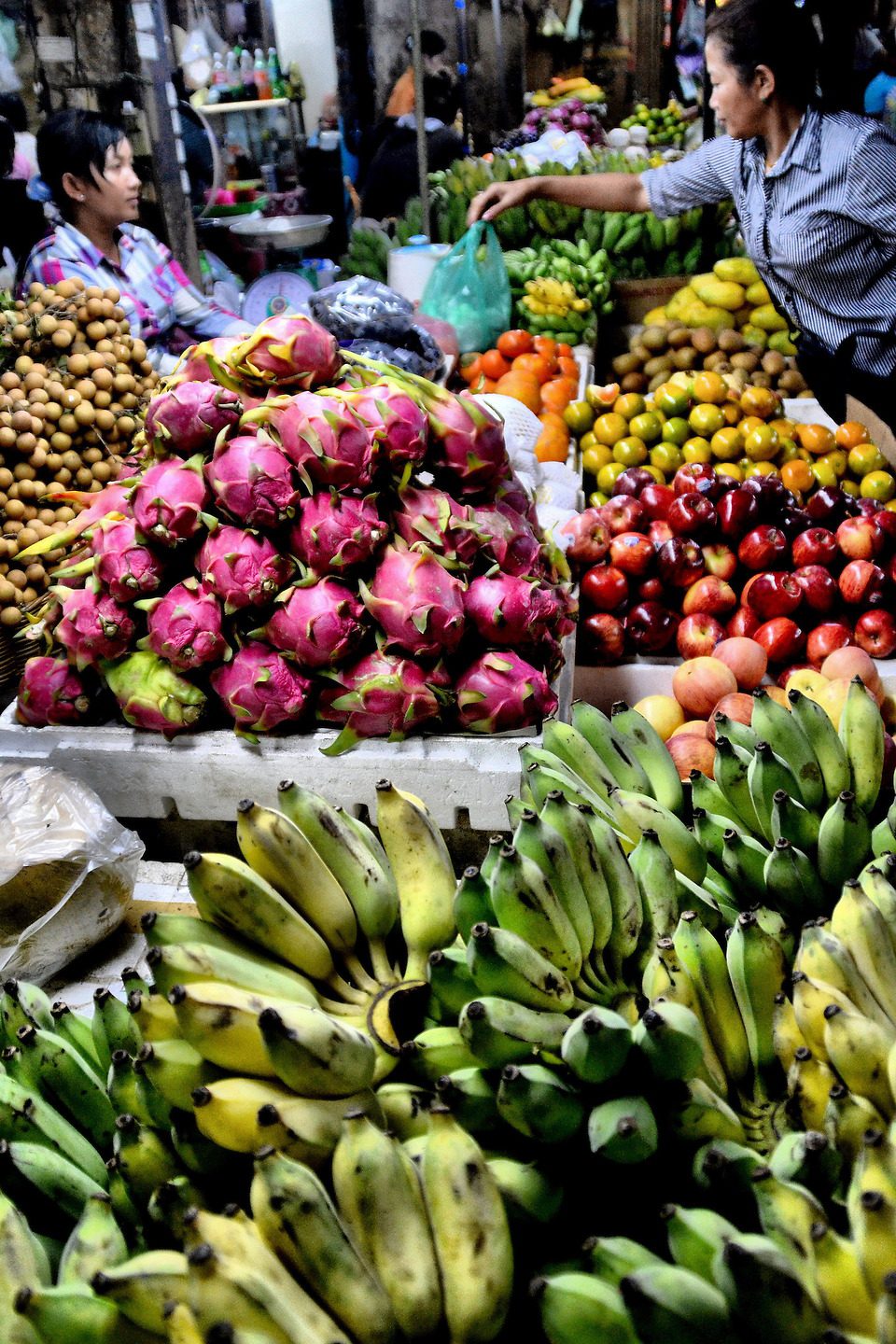 Woman Shopping for Produce at Phsar Chas in Siem Reap, Cambodia - Encircle Photos