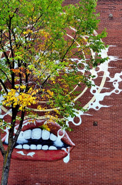 Red Lips Mural on Red Brick Wall in Montreal, Canada - Encircle Photos