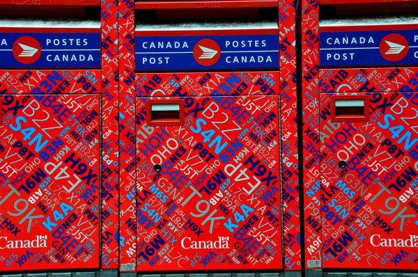 Colorful Red Post Office Boxes in Vancouver, Canada - Encircle Photos
