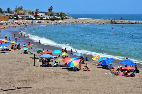 People Swimming and Sunning at Playa El Laucho in Arica, Chile - Encircle Photos