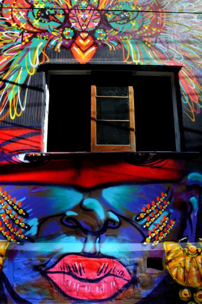 Blue Face Woman with Pink Lips Mural in Valparaíso, Chile - Encircle Photos