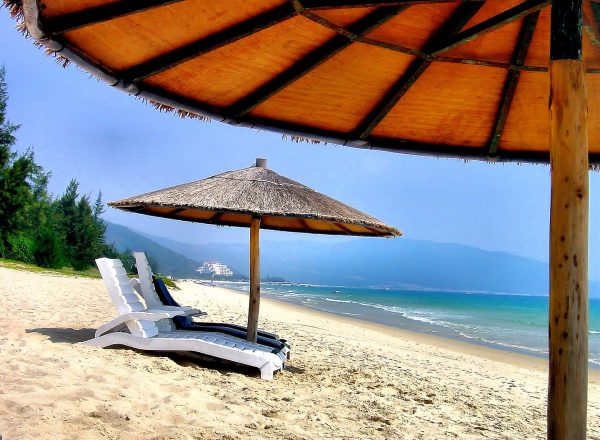 Thatched Umbrellas on Haitang Bay, Sanya, Hainan Island, China - Encircle Photos