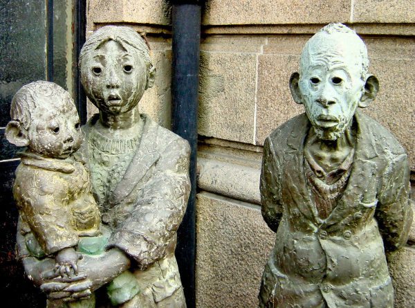 Chinese People Statues on Street Corner in Shanghai, China - Encircle Photos