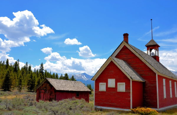 Old Malta Little Red Schoolhouse and Rocky Mountains near Leadville, Colorado - Encircle Photos