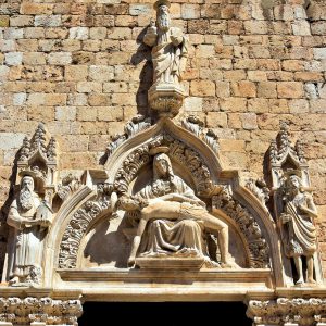 Pietà Carving on Little Brothers Church Door in Dubrovnik, Croatia - Encircle Photos