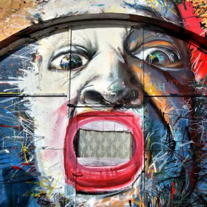 Male Caricature Mural in Punda, Eastside of Willemstad, Curaçao - Encircle Photos