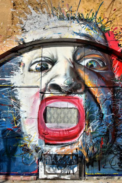 Male Caricature Mural in Punda, Eastside of Willemstad, Curaçao - Encircle Photos