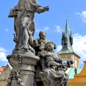 St. Ivo Statue on Charles Bridge in Prague, Czech Republic - Encircle Photos
