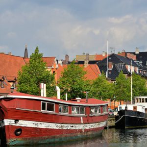 Boats Docked along Frederiksholm Kanal in Copenhagen, Denmark - Encircle Photos