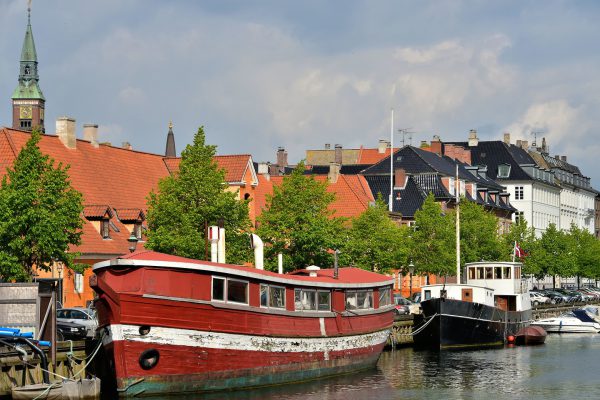 Boats Docked along Frederiksholm Kanal in Copenhagen, Denmark - Encircle Photos