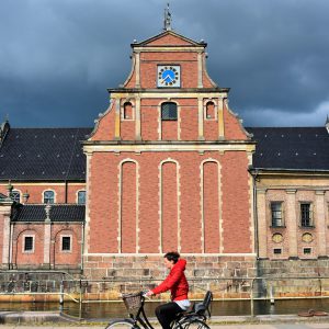 Cyclist in Front of Holmens Kirke in Copenhagen, Denmark - Encircle Photos