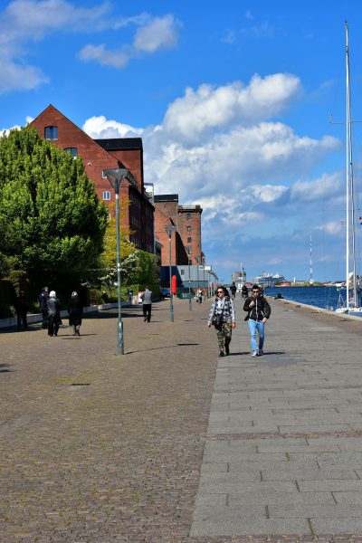 Couple Walking along Larsens Plads in Copenhagen, Denmark - Encircle Photos