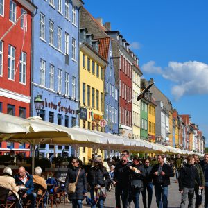 People Walking along Nyhavn in Copenhagen, Denmark - Encircle Photos