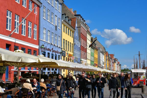 People Walking along Nyhavn in Copenhagen, Denmark - Encircle Photos