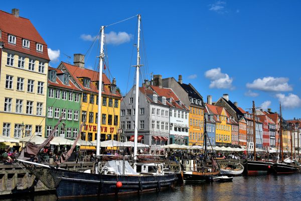 Sailing Ships Docked along Nyhavn in Copenhagen, Denmark - Encircle Photos