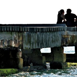 Young Couple in Love in Bradenton Beach, Florida - Encircle Photos