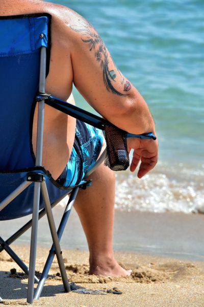 Man with Woman Tattoo in Fort Lauderdale, Florida - Encircle Photos