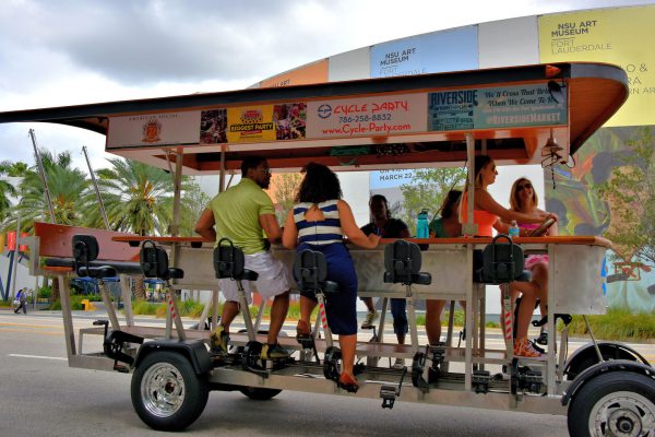 People Riding Pub Crawl Quadracycle in Fort Lauderdale, Florida - Encircle Photos