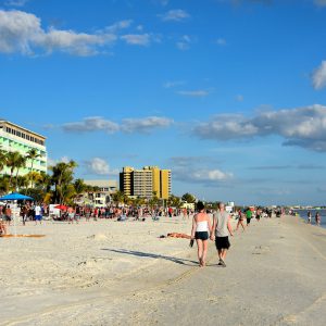 Couple Strolling Beach in Fort Myers Beach, Florida - Encircle Photos
