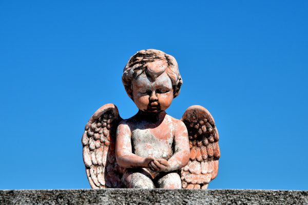 Cherub Monument at Key West Cemetery in Key West, Florida - Encircle Photos