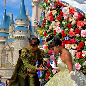 Princess Tiana and Prince Naveen on Parade Float at Magic Kingdom in Orlando, Florida - Encircle Photos