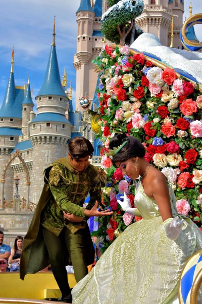 Princess Tiana and Prince Naveen on Parade Float at Magic Kingdom in Orlando, Florida - Encircle Photos