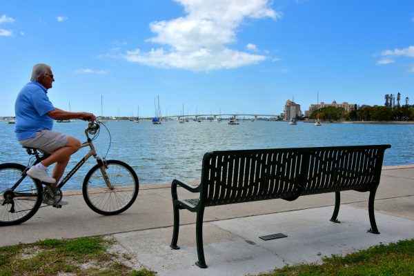 Man Riding Bicycle along Sarasota Bay in Sarasota, Florida - Encircle Photos