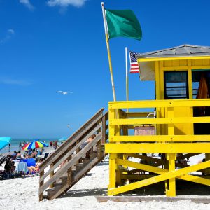 Green Flag at Siesta Beach on Siesta Key in Sarasota, Florida - Encircle Photos