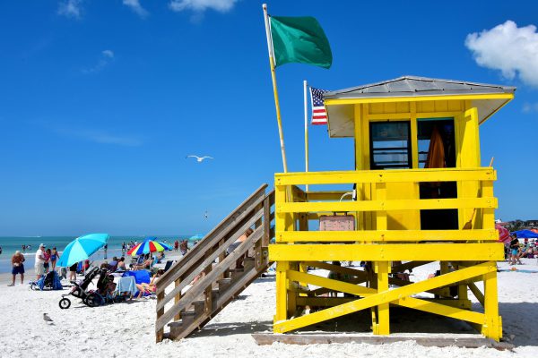 Green Flag at Siesta Beach on Siesta Key in Sarasota, Florida - Encircle Photos
